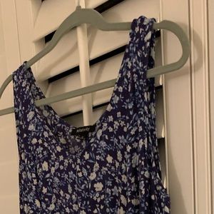 Navy and white Vneck sleeveless ruffled bottom mini dress.